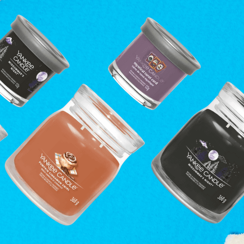 Yankee Candle new scents banner with Signature Tumbler jars and votives arranged diagonally on a bright blue and yellow torn-paper background.