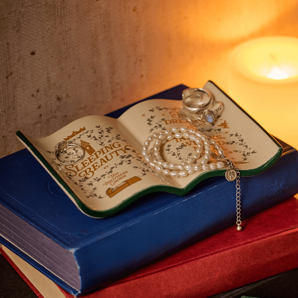 Bookish gifts for book lovers including ceramic book vases, candles, wax melts and literary-inspired home decor.