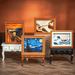 Four 52TOYS Living Paintings blind box collectible framed artworks displayed together on miniature tables