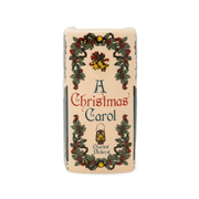 Decorative spine of A Christmas Carol book-shaped candle with holly, golden bells, lantern and Charles Dickens lettering