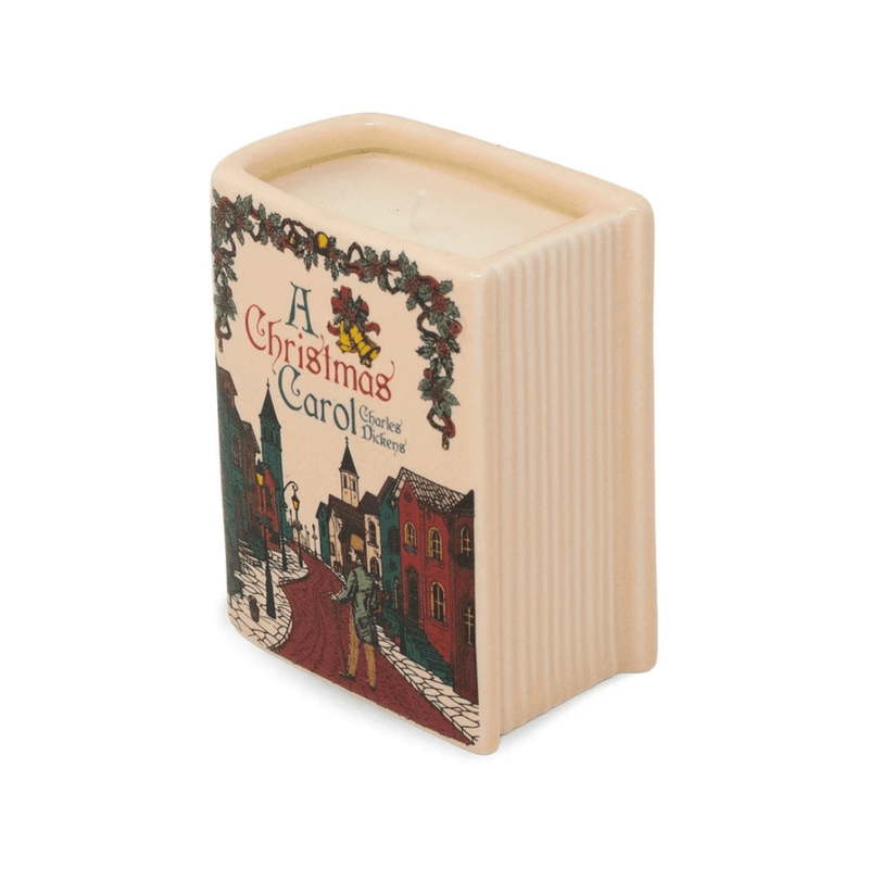 Unlit A Christmas Carol ceramic book candle showing its Victorian street cover and cream ceramic page detailing