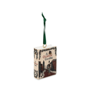 Angled view of A Christmas Carol ceramic Christmas decoration showing the Victorian street scene and illustrated spine