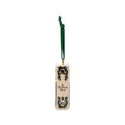 Spine of A Christmas Carol ceramic book ornament with Dickens lettering, festive greenery and green hanging ribbon