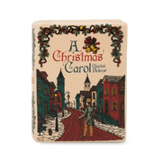 A Christmas Carol ceramic book scented candle with Victorian street illustration, holly garlands and Charles Dickens title