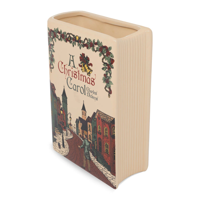 Angled view of A Christmas Carol ceramic book-shaped vase with sculpted page detailing