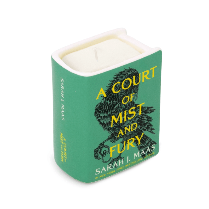 A Court of Mist and Fury ceramic book candle with green cover, cream-coloured pages and single wick