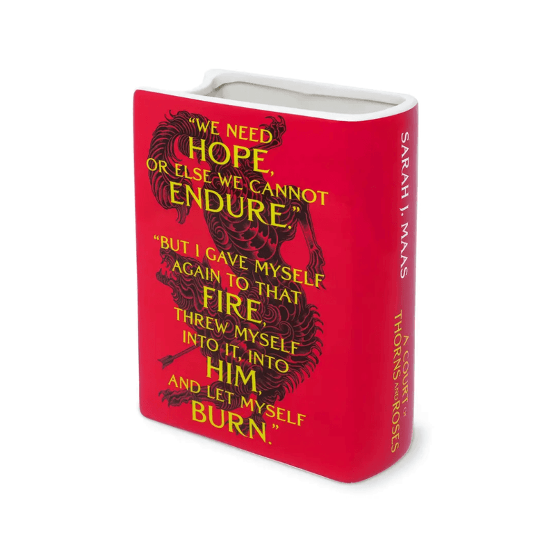 A Court of Thorns and Roses ceramic book vase showing quote design and spine