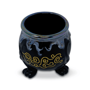 Angled view of Sarah J. Maas Cauldron vase showing its open top and iridescent glaze