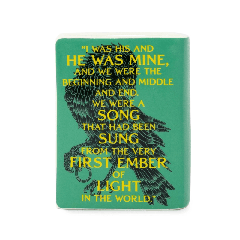 Back of A Court of Mist and Fury ceramic book candle with a printed passage from the novel