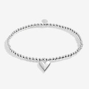 “Silver‑plated adult bracelet with polished heart charm – cut‑out”
