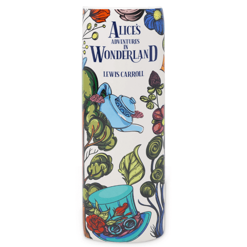 Close-up of ceramic Alice’s Adventures in Wonderland vase showing embossed page texture