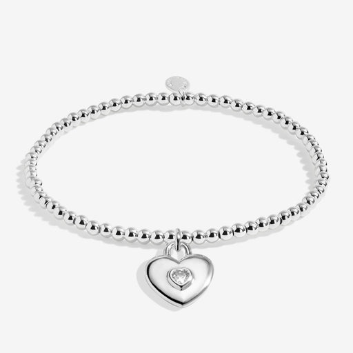 Full view of Joma Jewellery A Little Amazing Mum To Our Family Bracelet, silver-plated beaded stretch Bracelet with heart charm.