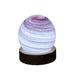 Amethyst Haze planet USB night light with swirling lilac and rose bands on wooden base, 8 cm gift lamp for children
