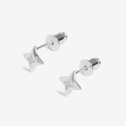 “Angled close‑up showing pavé detailing on starburst stud earrings”
