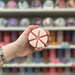 Aphrodite light pink segmented wax melt held in hand