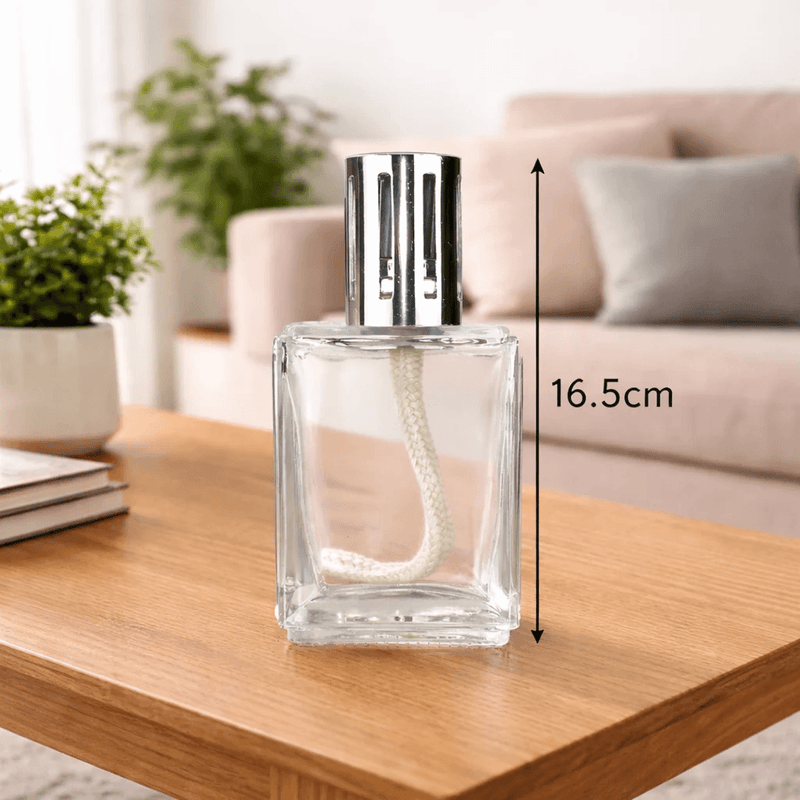 Large clear-glass Ashleigh & Burwood fragrance lamp with silver detailing measuring 16.5cm high