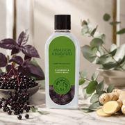 Ashleigh & Burwood Elderberry & Purple Basil Lamp Fragrance displayed with elderberries, purple basil, eucalyptus and ginger
