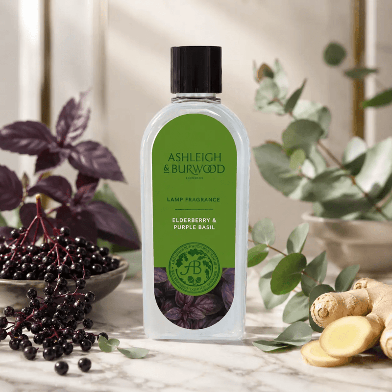 Ashleigh & Burwood Elderberry & Purple Basil Lamp Fragrance displayed with elderberries, purple basil, eucalyptus and ginger