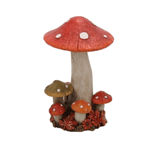 Front view of an autumn mushroom decoration, 7 x 12cm, with red and orange spotty toadstools on a leafy base.