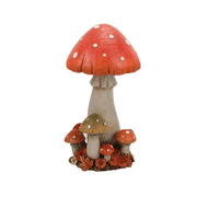  Large 15 x 29cm toadstool ornament with red spotted cap and small mushrooms on a leafy base, white background.