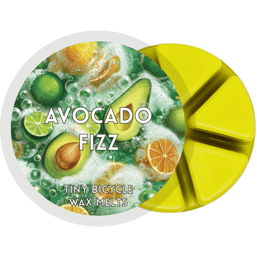 Avocado Fizz segmented wax melt pot with green wax segments and citrus avocado label design