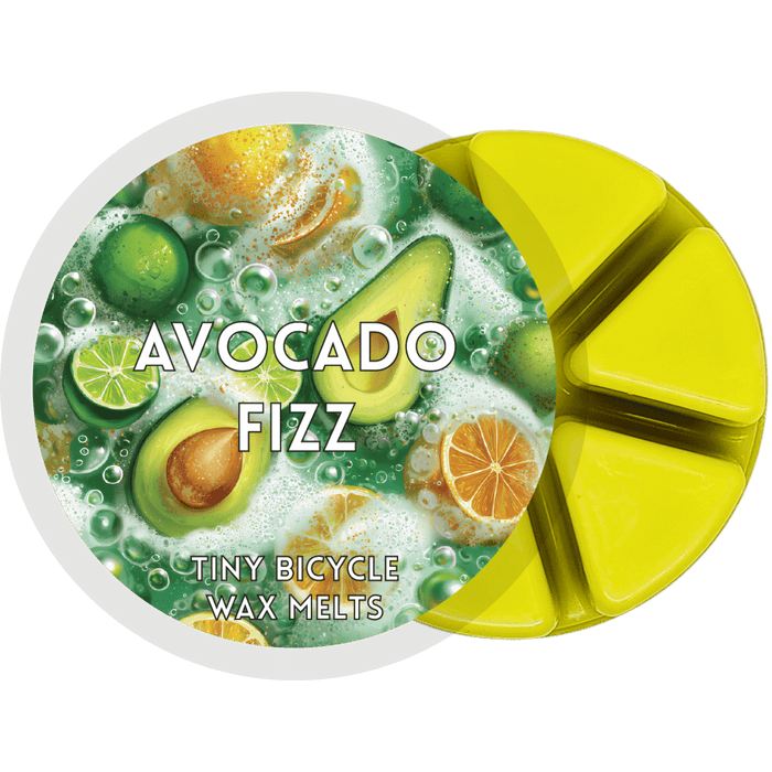Avocado Fizz segmented wax melt pot with green wax segments and citrus avocado label design