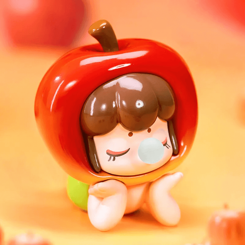 Apple-topped Baby Nanci with red shiny helmet and green backpack – Fruits Blind Box
