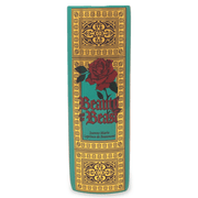 Side spine of Beauty and the Beast ceramic book vase with teal cover, gold ornate details, red rose and vintage book design.