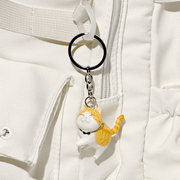 Best Friend Cat Figure Collectable Keyring Random Box orange tabby cat charm attached to a white backpack