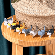 Best Friend Cat Figure Collectable Keyring Random Box cat figures displayed together on a wooden stool