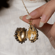 Bill Skinner Blackberry & Mouse Locket Necklace opened to reveal field mouse