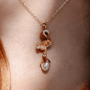 Bill Skinner Squirrel & Acorn Pendant Necklace close-up