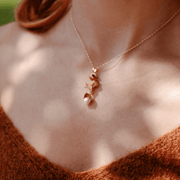 Bill Skinner Squirrel & Acorn Pendant Necklace worn