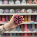Black Cherry purple segmented wax melt held in hand