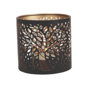 Black metal tealight burner with intricate tree design

