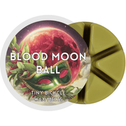 Blood Moon Ball wax melt label with crimson moon and green masquerade mask; spiced juniper, musk and cedar home fragrance wax melts