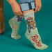 Blue Q Boss Kitty women’s crew socks with cowboy cat lasso design on mint green