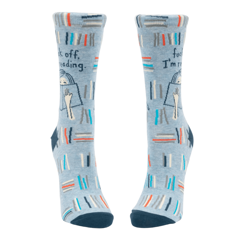 Front view of Blue Q F*** Off I’m Reading socks with book stacks and cat motif