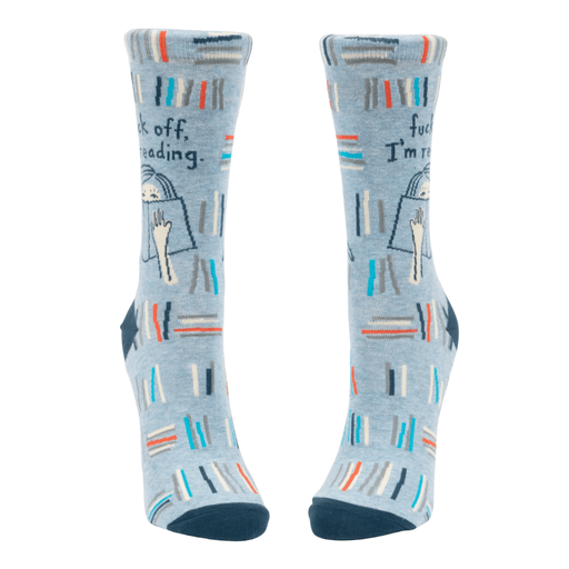 Front view of Blue Q F*** Off I’m Reading socks with book stacks and cat motif