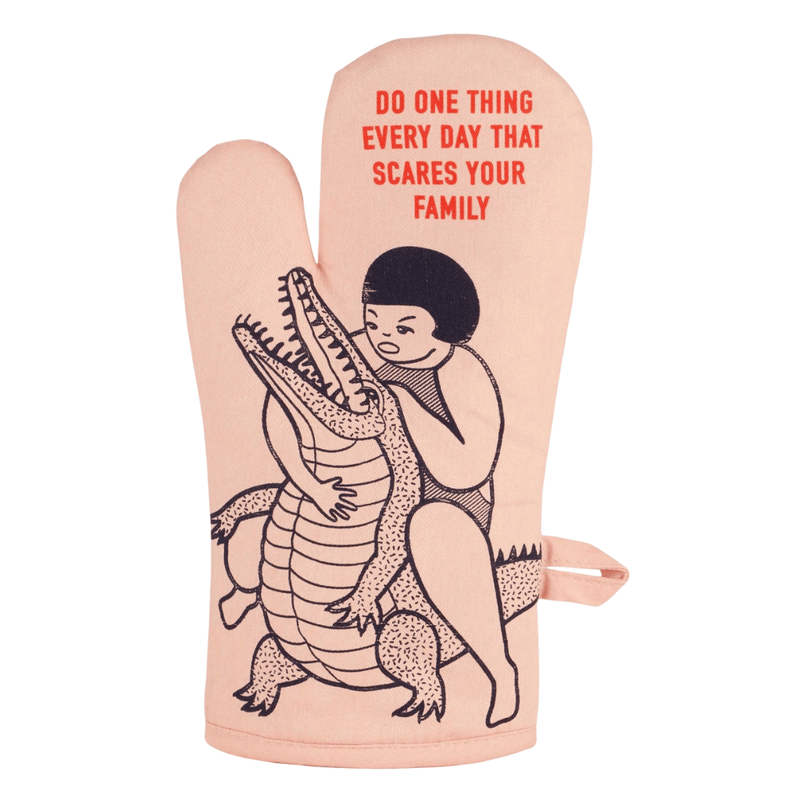 Front of Blue Q oven mitt - Do one thing every day that scares your family