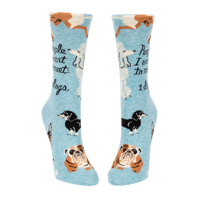 Front view of Blue Q women’s crew socks in sky blue with doodled dog breeds and the slogan People I want to meet: dogs