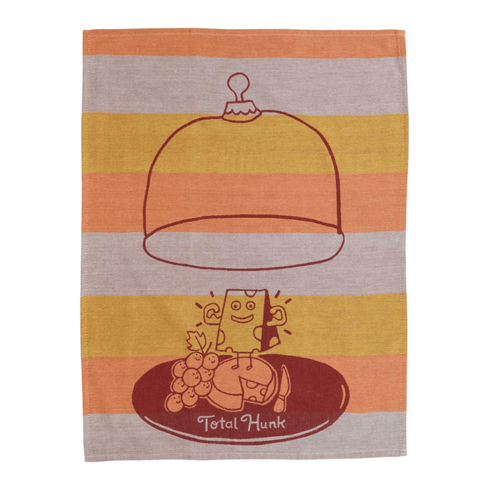 Full tea towel laid flat with cheese and grapes design on mustard, orange and mauve stripes