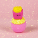 Bomb Cosmetics Fizzy Fries Bath Blaster with cute fries topper on a pink glittery background