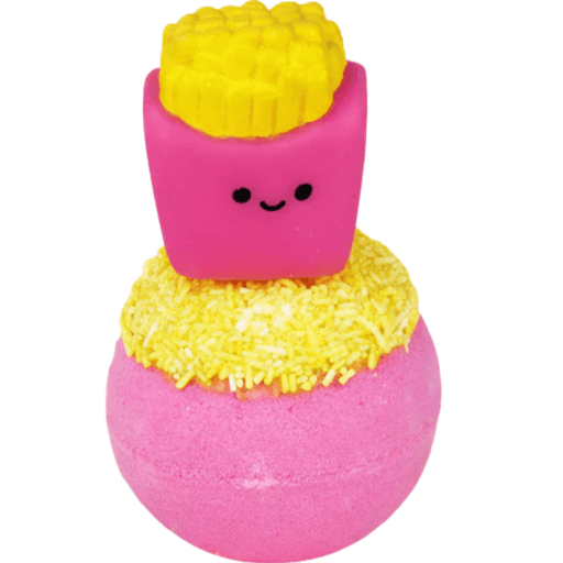 Bomb Cosmetics Fizzy Fries Bath Blaster with fries toy topper and yellow sprinkle-style topping on a pink bath bomb