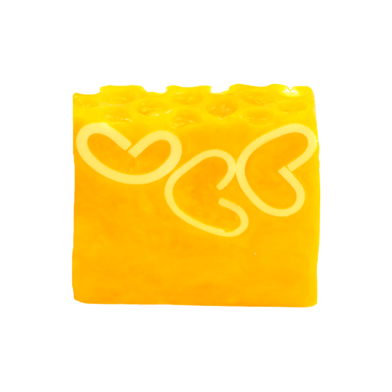 Bomb Cosmetics Honey Bee Good Soap Slice on a white background with yellow colour and heart design
