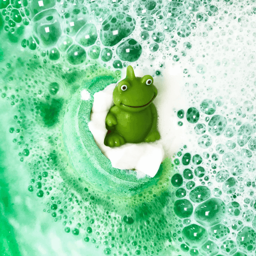 Bomb Cosmetics It’s Not Easy Being Green Bath Blaster fizzing in the bath creating green water with frog topper