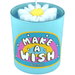 Bomb Cosmetics Make A Wish flower candle—turquoise jar with white wax daisy bloom, clary-sage & ylang-ylang scent.