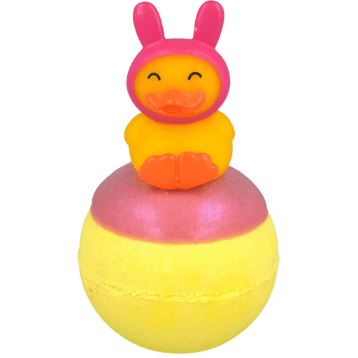 Bomb Cosmetics Snuggle Duck Bath Blaster with bunny hat duck topper and yellow bath bomb on a white background