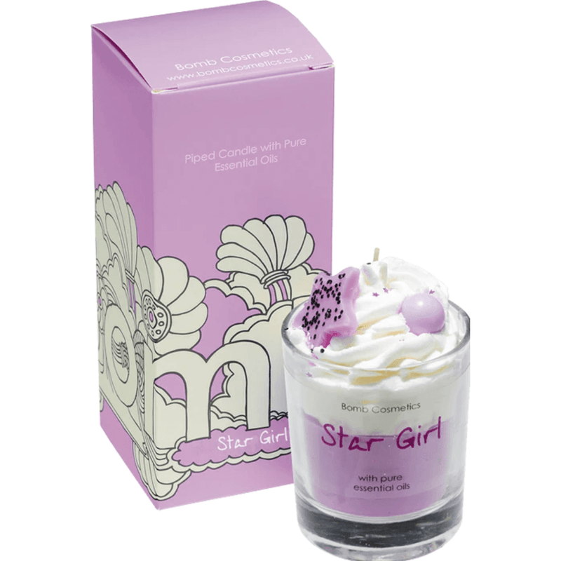 Bomb Cosmetics Star Girl piped scented candle—lavender base, whipped wax star topper, beside matching lilac gift box.