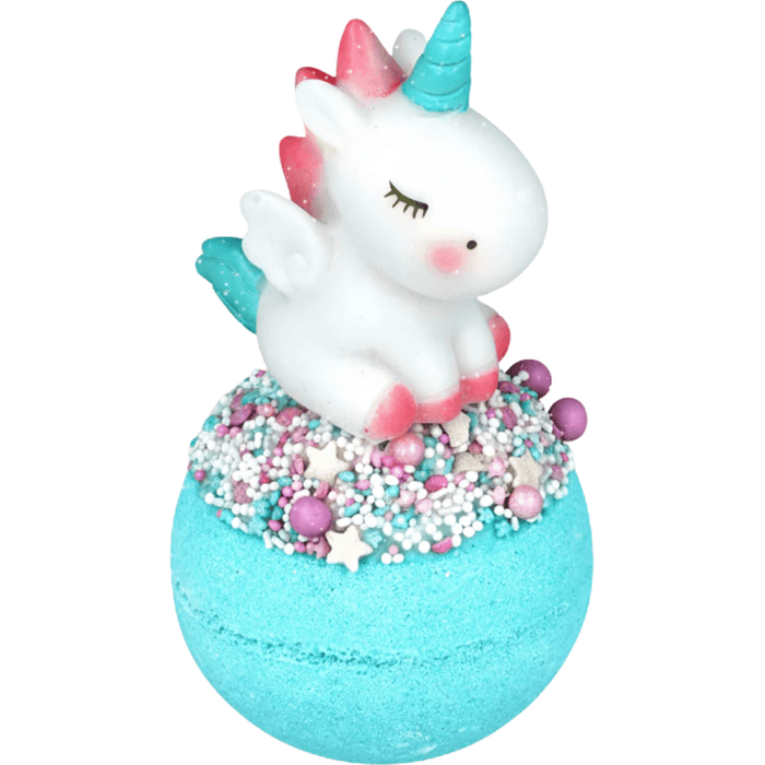 Bomb Cosmetics Unicorn Stardust Bath Blaster with unicorn toy topper and sprinkle-style topping on a blue bath bomb
